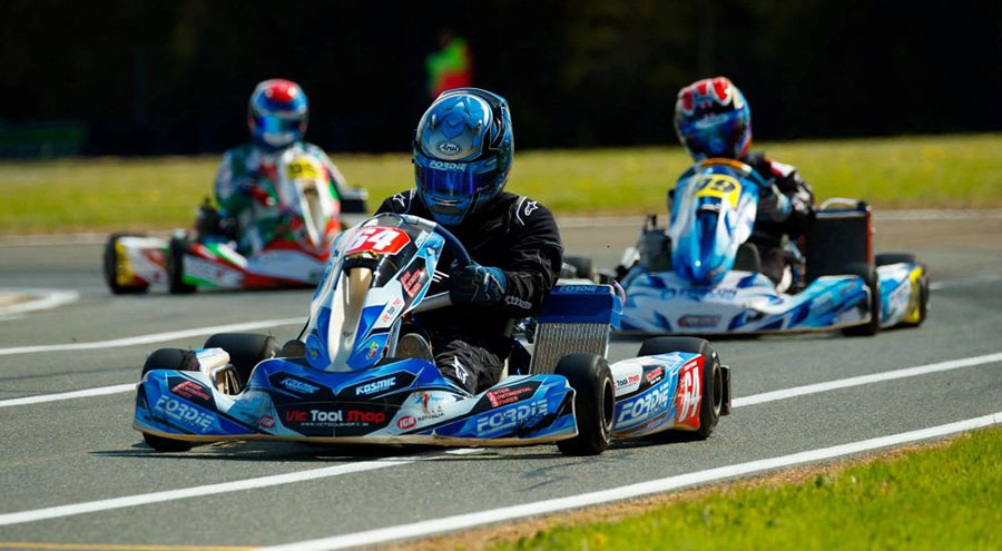 Go kart racers on the Rochester Go Kart Club track.