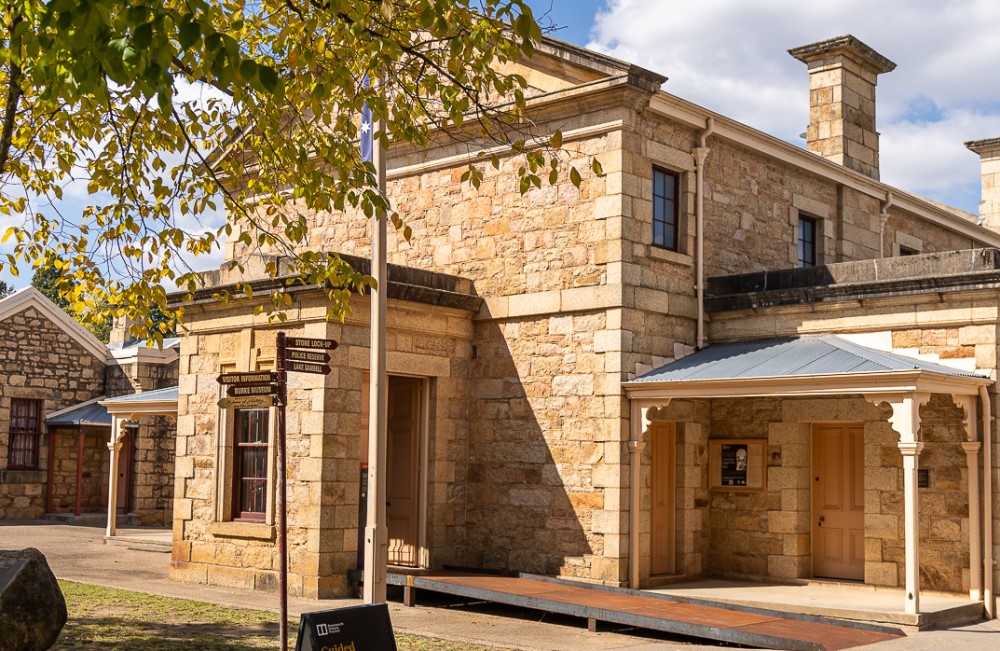 External view of old sandstone brick Beechworth courthouse.