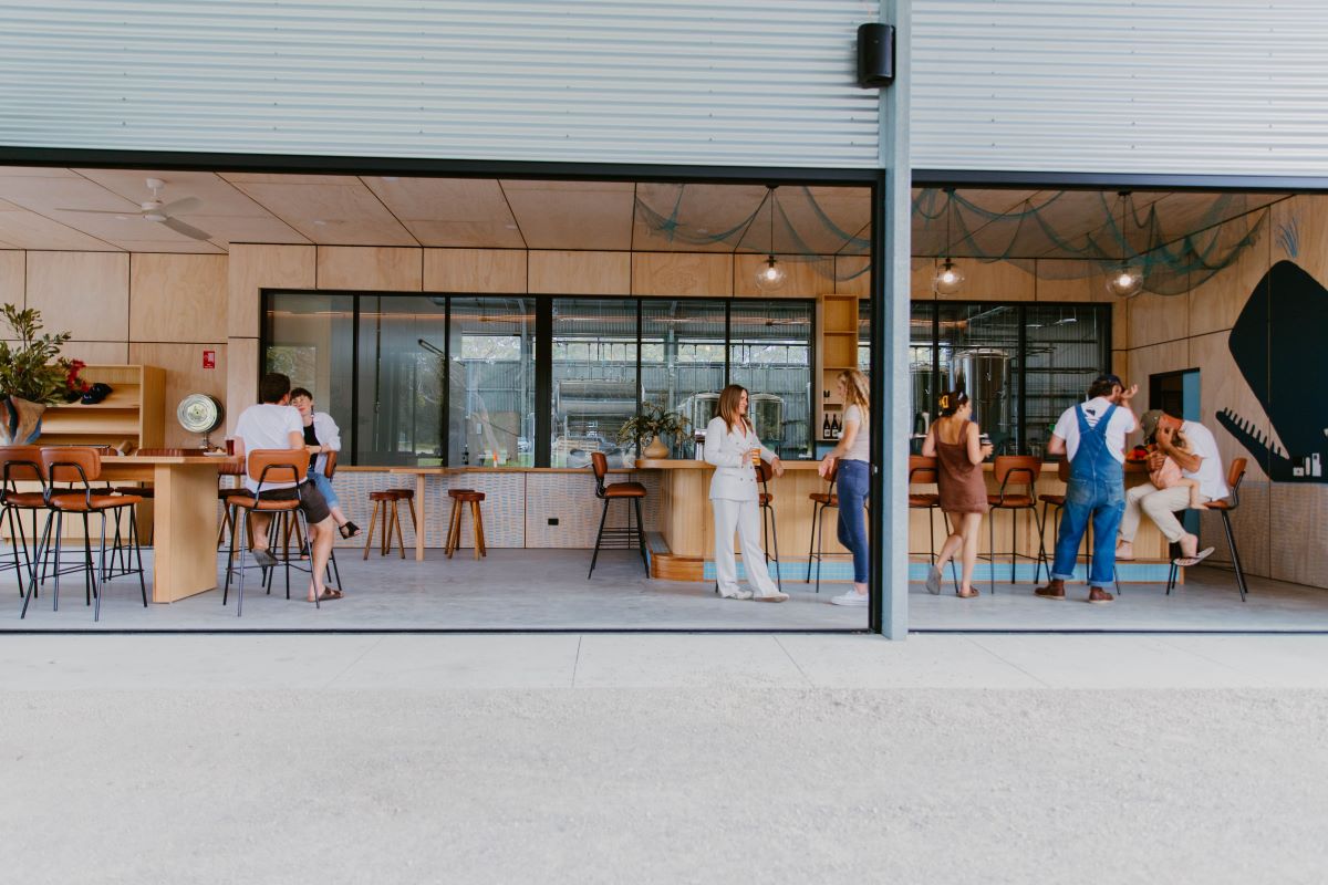 People drinking at the Dunetown cellar door