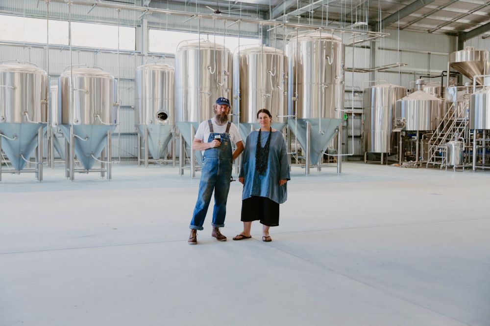 An image of Sailors Grave Brewing's founders in the new Dunetown beer distillery.