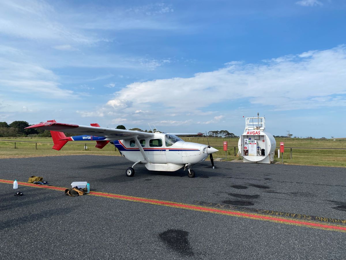 A plane being refuelled on the tarmac