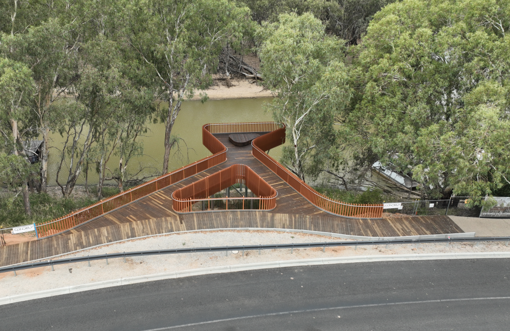 New boardwalk with viewing platform over Murray River, surrounded by riverbanks and trees.